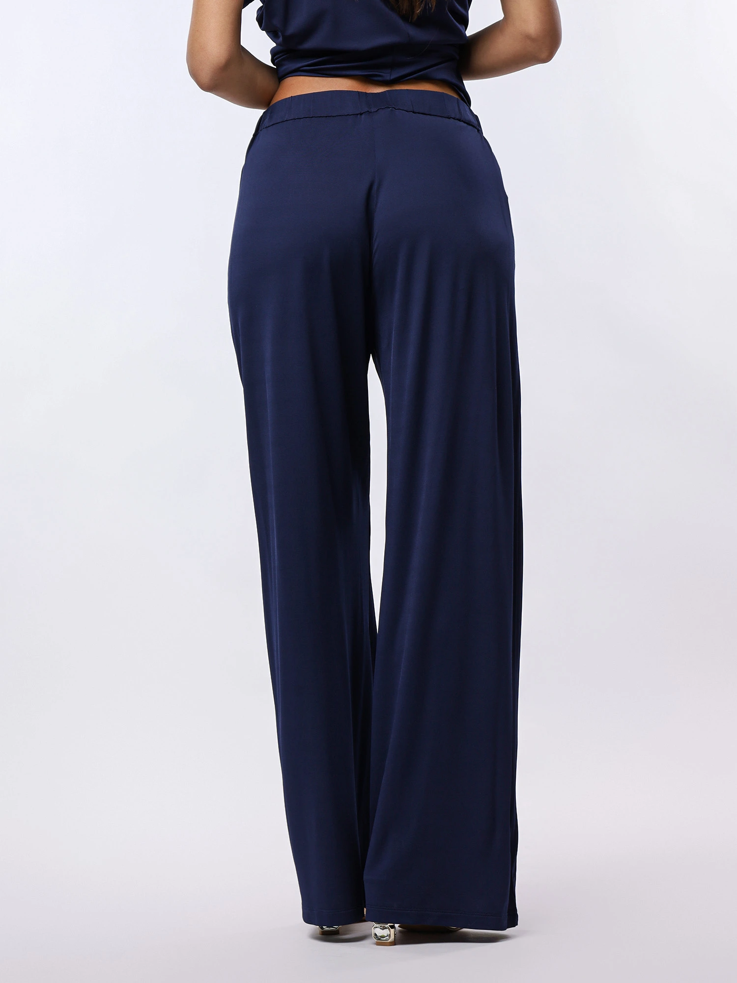 Брюки трикотажные темно-синего цвета с эластичным поясом